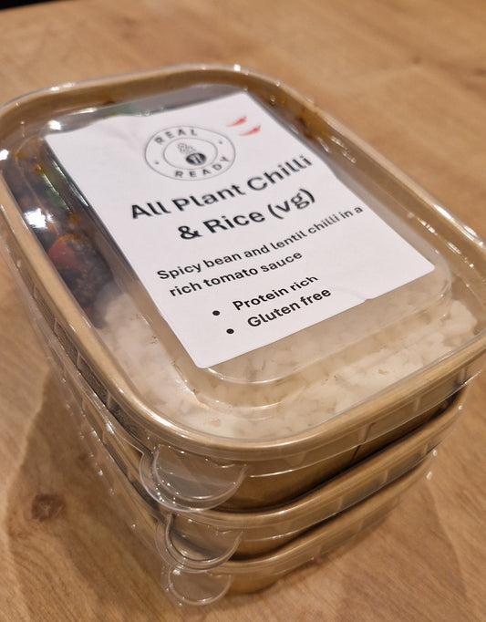 Stack of meal boxes with all-plant chilli shown